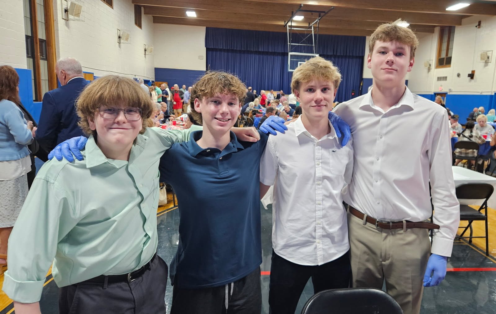 Juniors cleaning up and breaking down tables